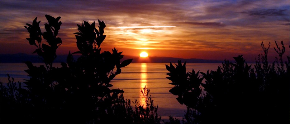 Il Tramonto dello stretto dalla Costa degli Dei